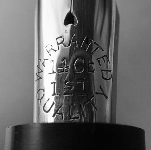 15. EE. Europa correct WARRANTED nib inscription.jpg