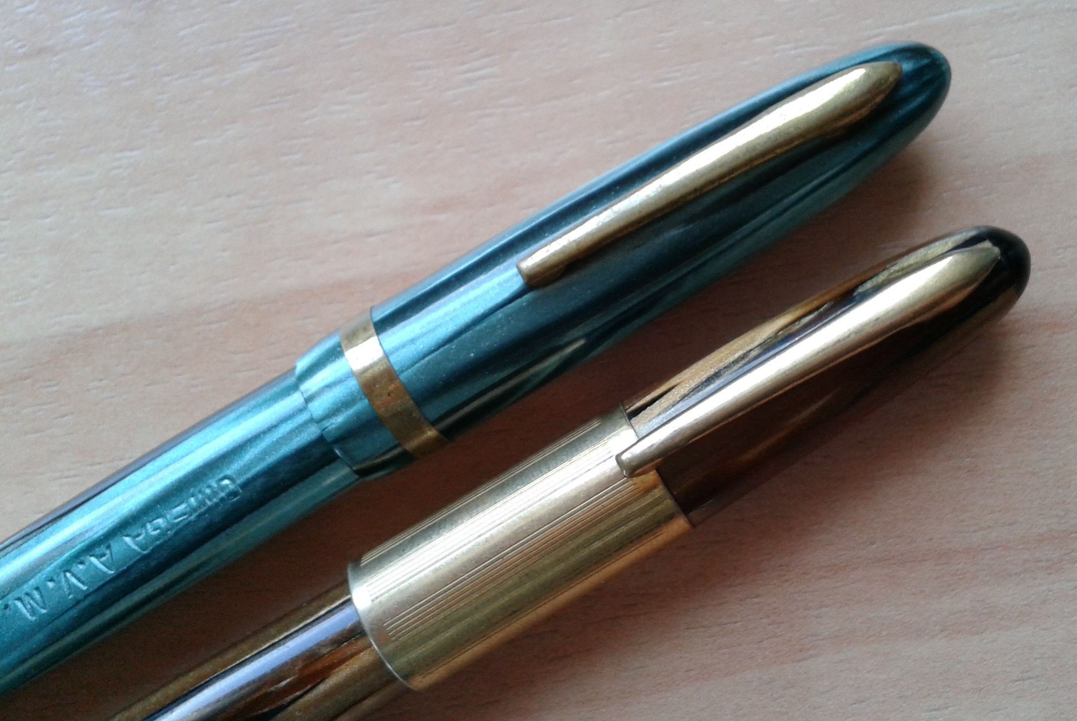 13. wek-pen and omega a.v.m. caps.jpg